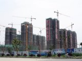 临近活力岛，现代化的建筑外立面，规划以高品质公寓为主